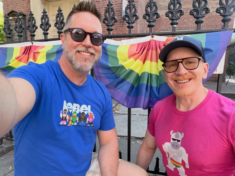 Two friends at Pride in the Rebel tee and a pink Uno the Unicorn tee